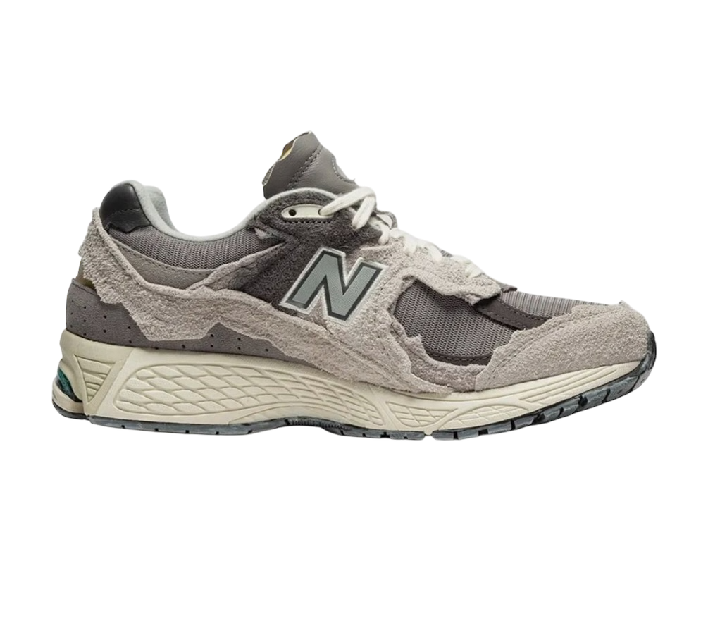 barely used new balance 2002r rain cloud protection pack