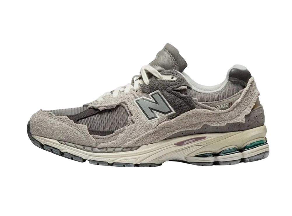 barely used new balance 2002r rain cloud protection pack