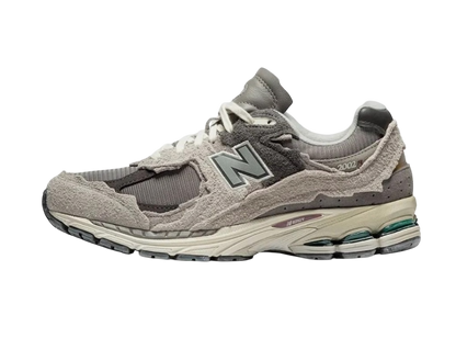 barely used new balance 2002r rain cloud protection pack